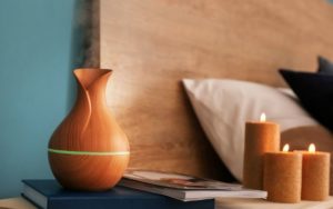 humidifier on bedside table with candles