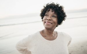 Smiling woman on beach