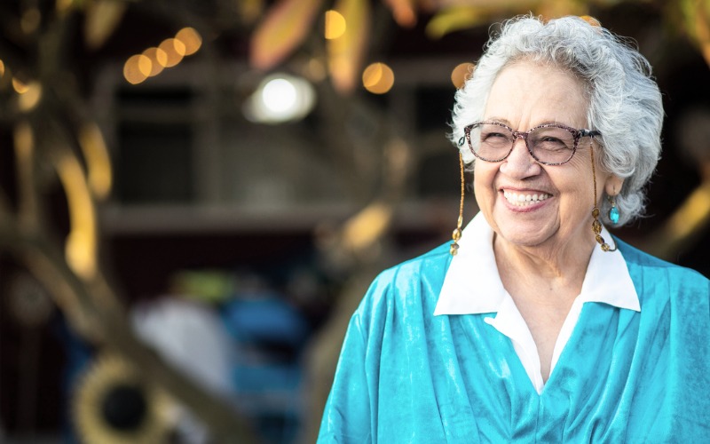 Smiling older woman with glasses