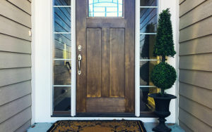 front door with shrubbery