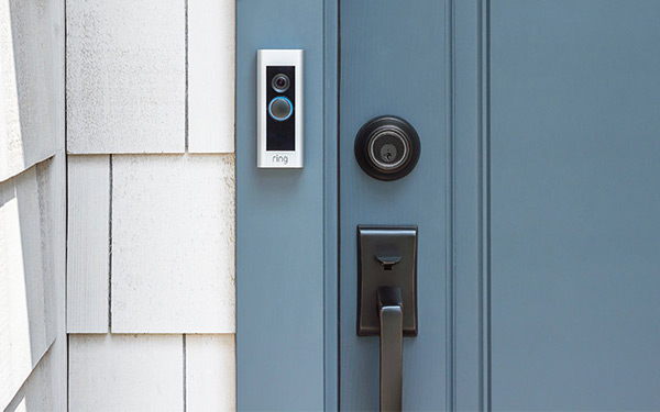 ring-doorbell-on-blue-door