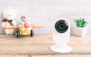 Home Security Camera on Shelf with Toys