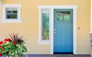 front entrance of a home with blue door picture id187890234 1