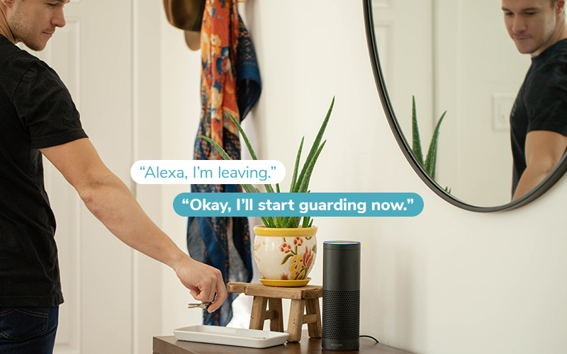 Person leaving house asking Alexa to arm Alexa Guard