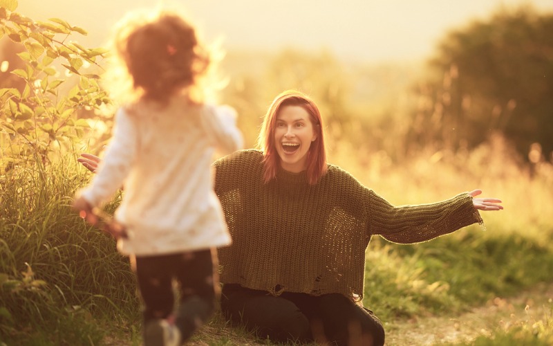 mother in field calling to her daughter