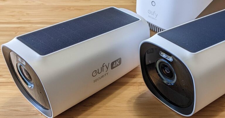 Eufy camera 3 with solar panels built in the top, sitting on a wooden counter