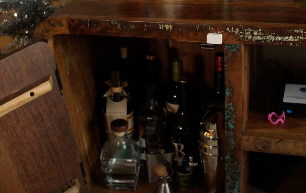 liquor cabinet with contact sensor