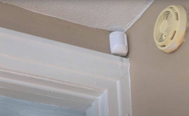 Cove security motion sensor on top of doorway