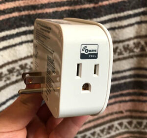 Frontpoint's Zwave Plus smart plug has two outlets: one on each side