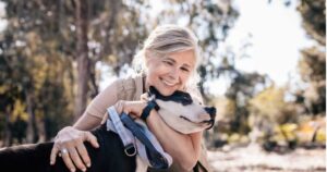 Woman with dog in nature