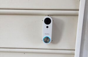 SimpliSafe Video Doorbell Pro on a wall after installation
