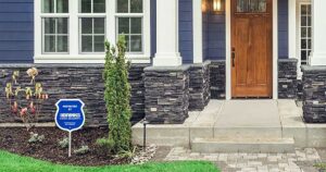 brinks security sign in house yard