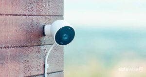 Nest outdoor security camera on house