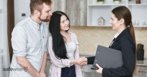 insurance-agent-shaking-hands-with-couple