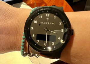 SafeWise tester modeling the Tranquil GPS watch for on their wrist.
