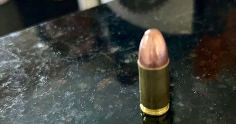photo of a bullet found outside my home after a shooting in the night.