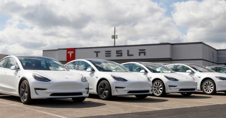 Indianapolis - Circa September 2019: Tesla electric vehicles awaiting preparation for sale.