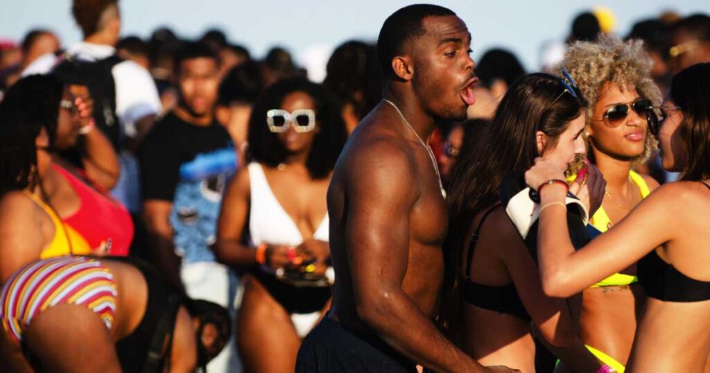 Young people gather on South Beach for the annual spring break vacation from schools and colleges.