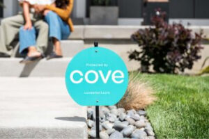 Cove sign in a yard.