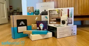 Abode's security kit, smart security kit, iota, and multiple sensors piled up in my apartment after getting them from Abode to test.
