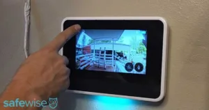 Vivint panel on wall showing view from one of Vivint's Outdoor Camera Pro cameras.