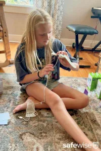 Our kid tester figuring out how to charge the myFirst Fone R2.