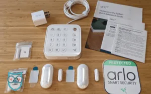 Arlo Home Security kit laid out on a table