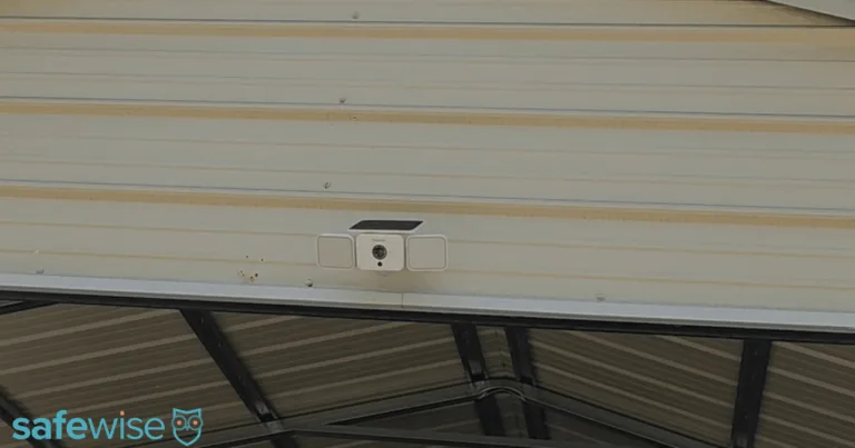 The Reolink Solar Floodlight Cam installed on a carport.