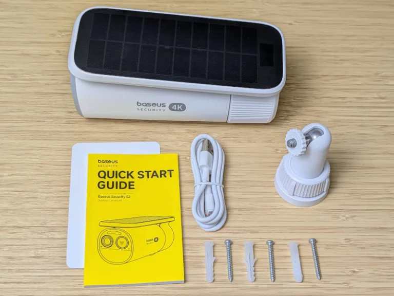 Contents of the Baseus Security S2's box on a table