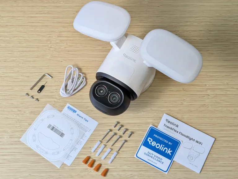 reolink trackflex floodlight wifi security camera box contents on desk