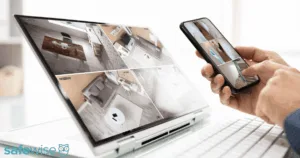 Person looking at security footage on laptop