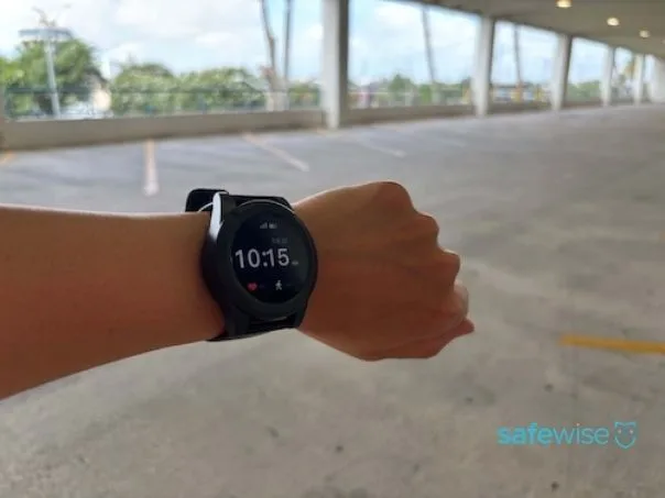 LifeStation smartwatch on wrist in parking garage for GPS testing