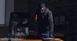 Burglar stealing