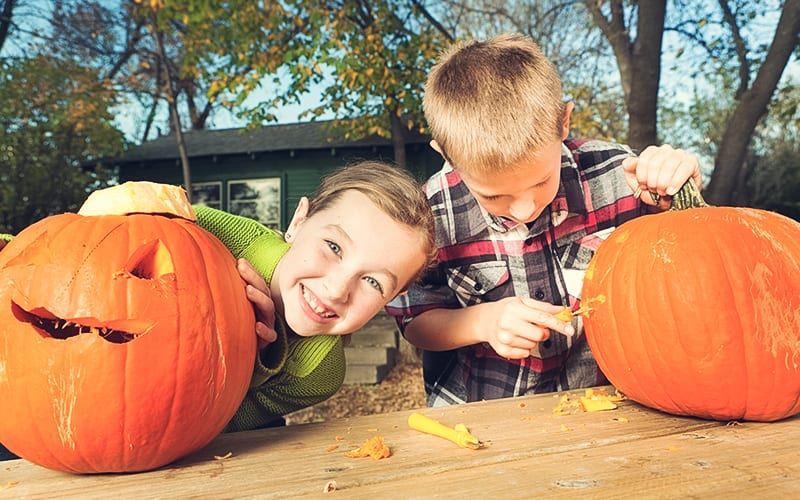 How old should a kid be to carve a pumpkin?